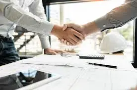 two people shaking their hands together representing contract staffing